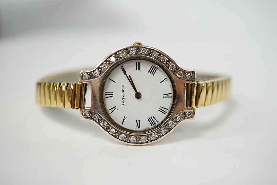 A lady's modern 9kt Bueche Girod quartz wrist watch, with diamond set bezel, case diameter 25mm, on a steel and gold plated flexible bracelet (detached), with Bueche Girod box. Condition - poor to fair